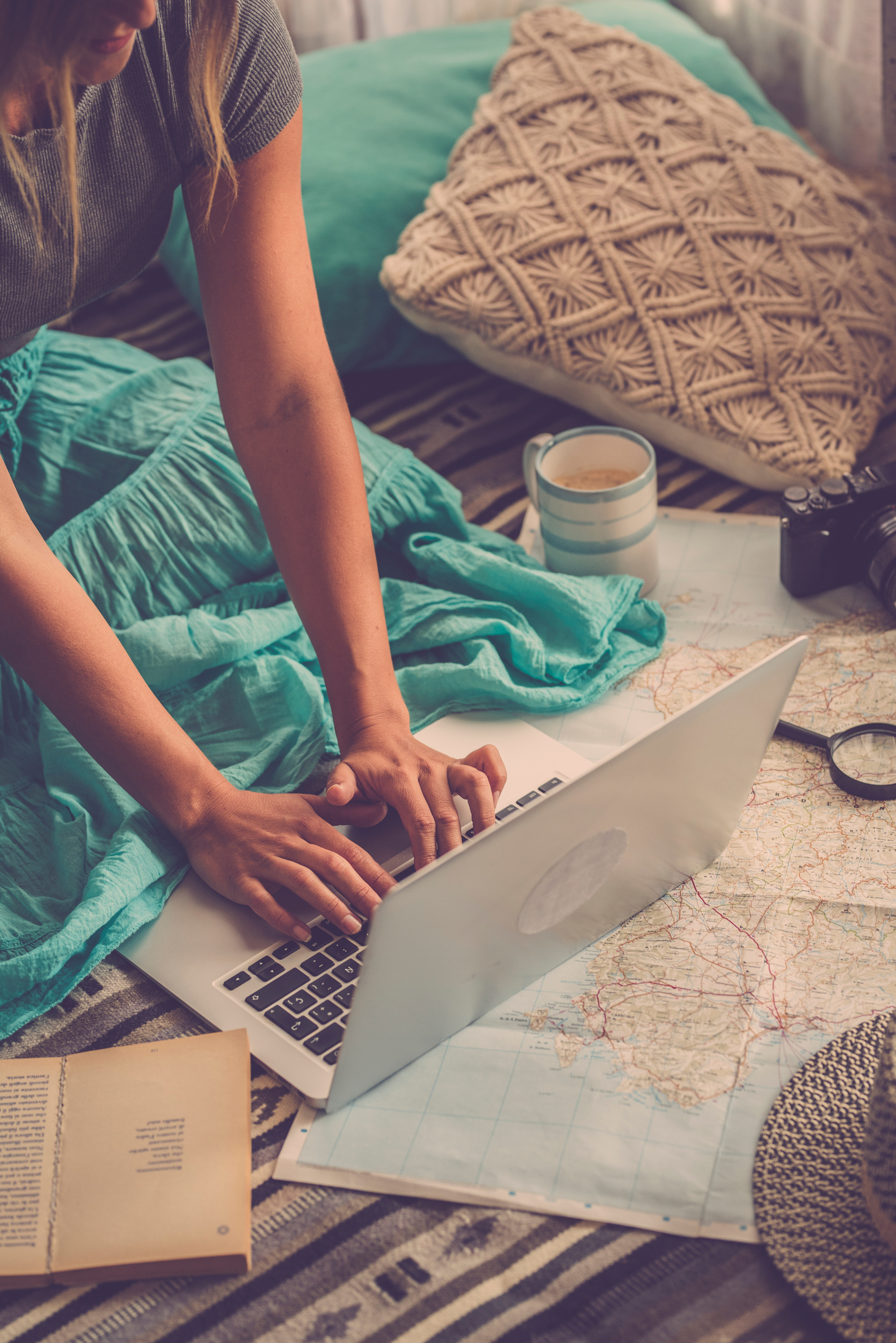 Woman Planning a Vacation on Laptop